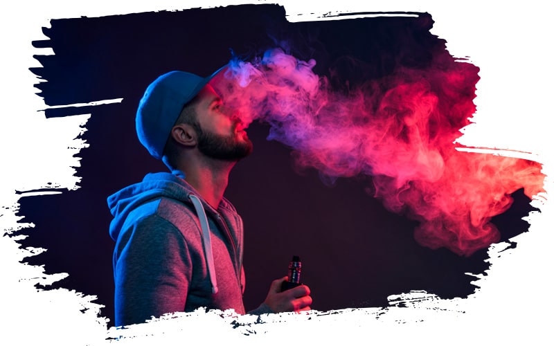 Junge Mann am Dampfen mit einem Vaporizer
